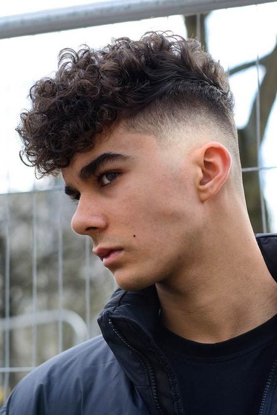 Wavy drop fade - curly hair style for boys