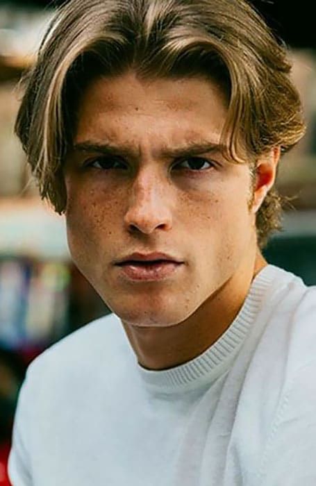 Middle part hairstyle for men